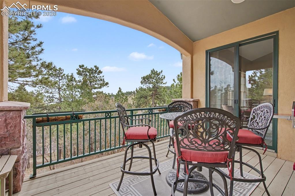 Image 19 of 45: Enjoy year-round, elevated outdoor living on the covered main-level deck, o