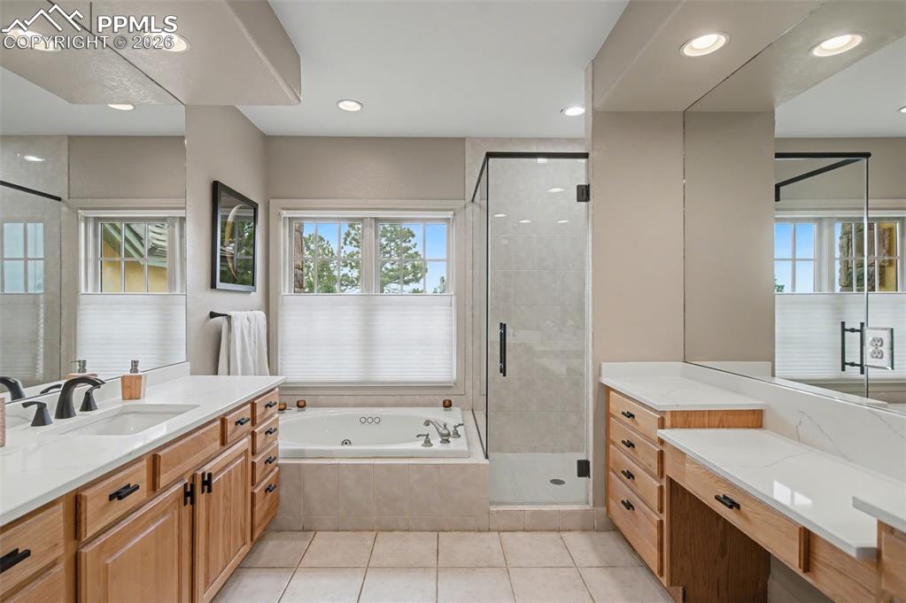 Image 24 of 45: Unwind after a day on the private trails in the deep jetted soaking tub, pe