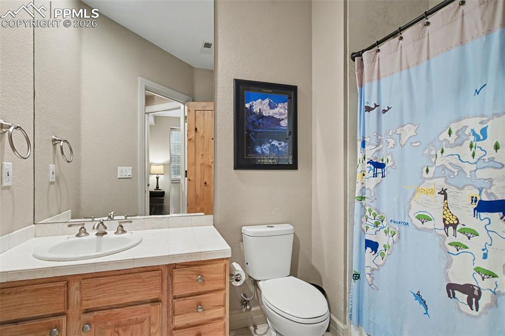 Image 38 of 45: With four thoughtfully appointed bathrooms throughout the home, everyday co
