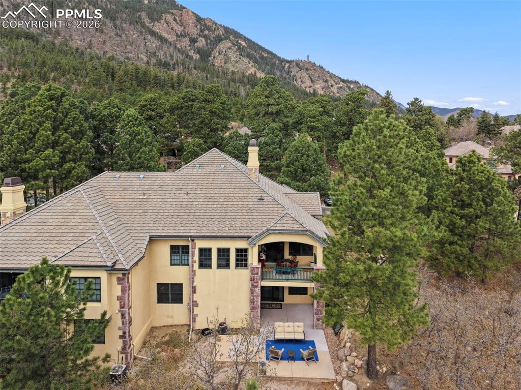 Image 41 of 45: Nestled seamlessly into the hillside, this estate embodies elevated mountai