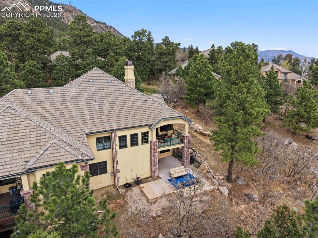 Image 42 of 45: Multiple tiers of outdoor living, from the covered upper deck to the expans