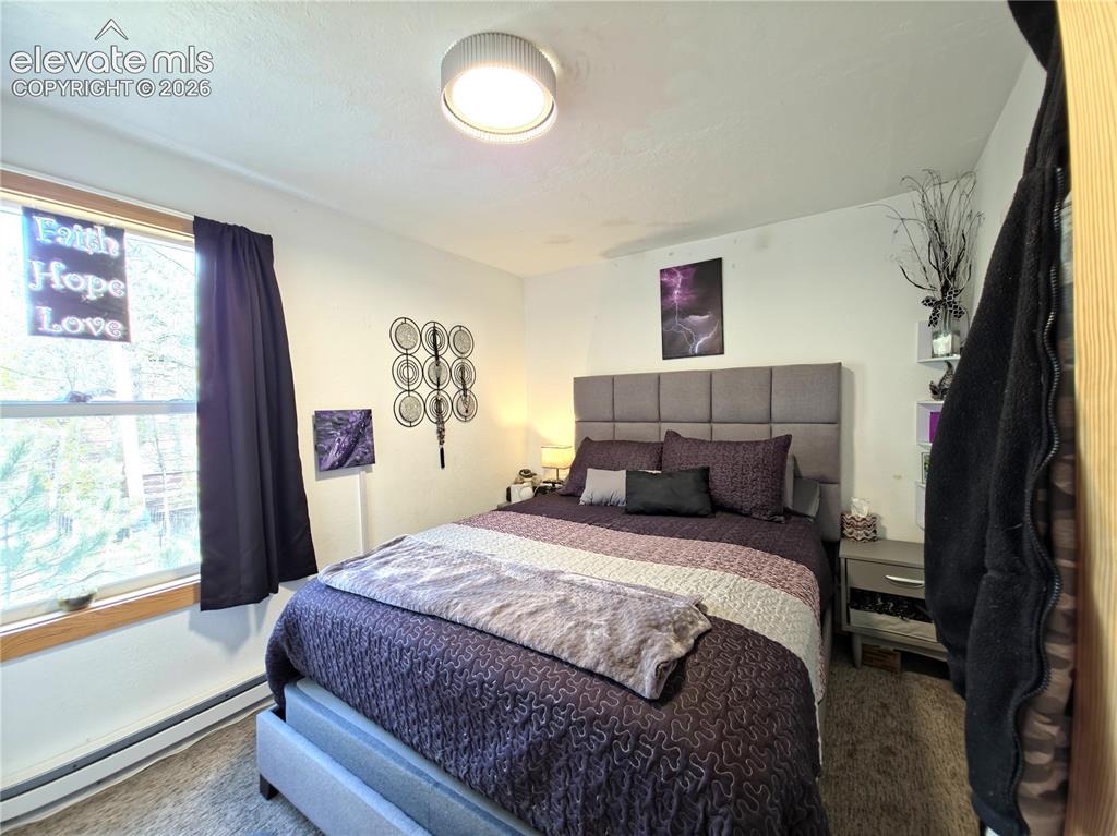 Image 10 of 24: Primary Bedroom