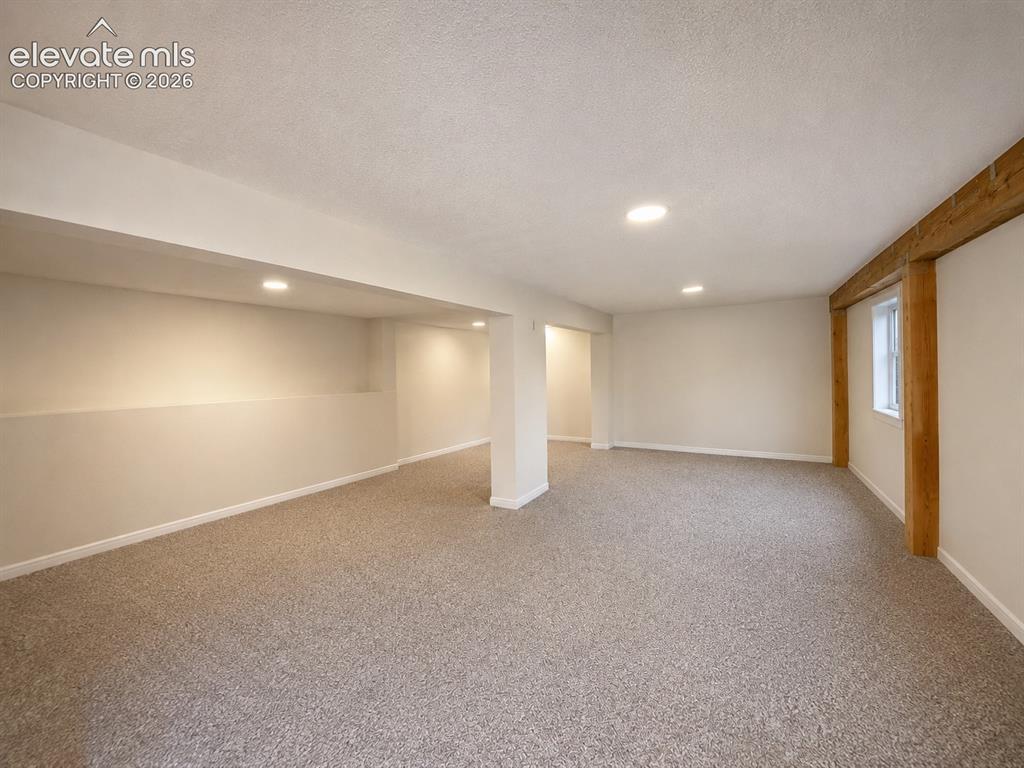 Image 21 of 24: Lower Level Room/Bedroom. Laundry Location
