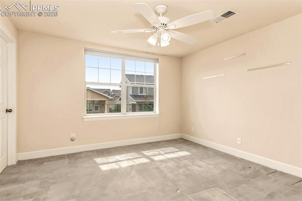 Image 15 of 34: Bedroom 2 with connecting full bathroom and walk in closet