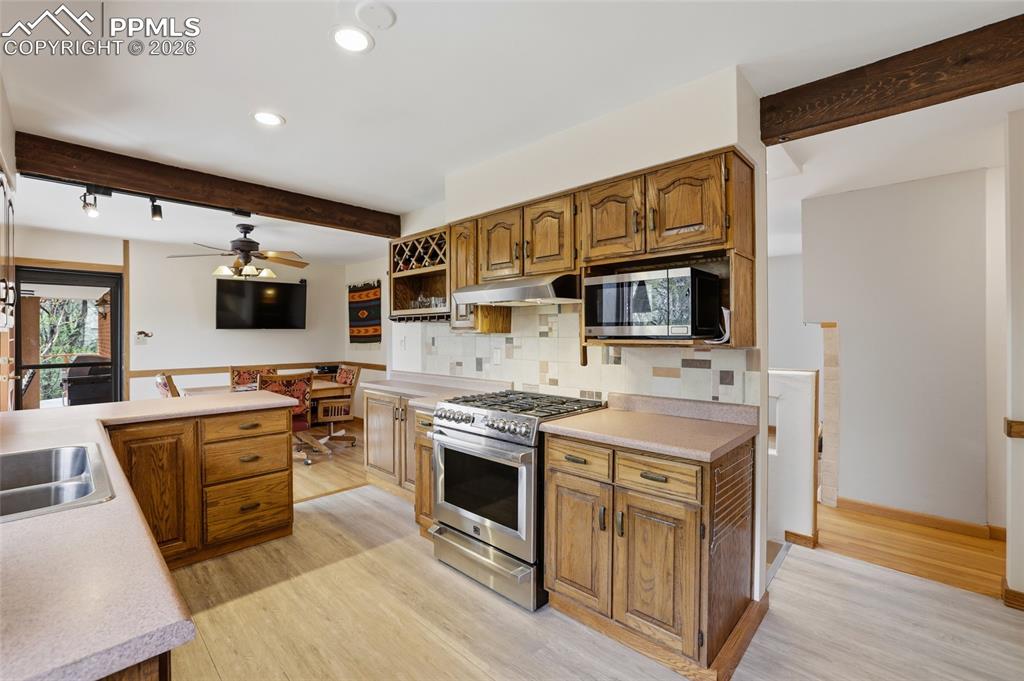 Image 10 of 50: view of dining room and kitchen