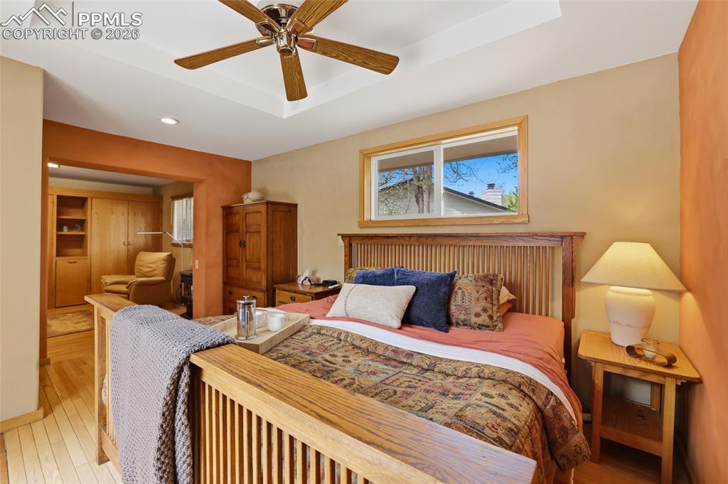 Image 15 of 50: Primary bedroom suite with sitting area and fireplace