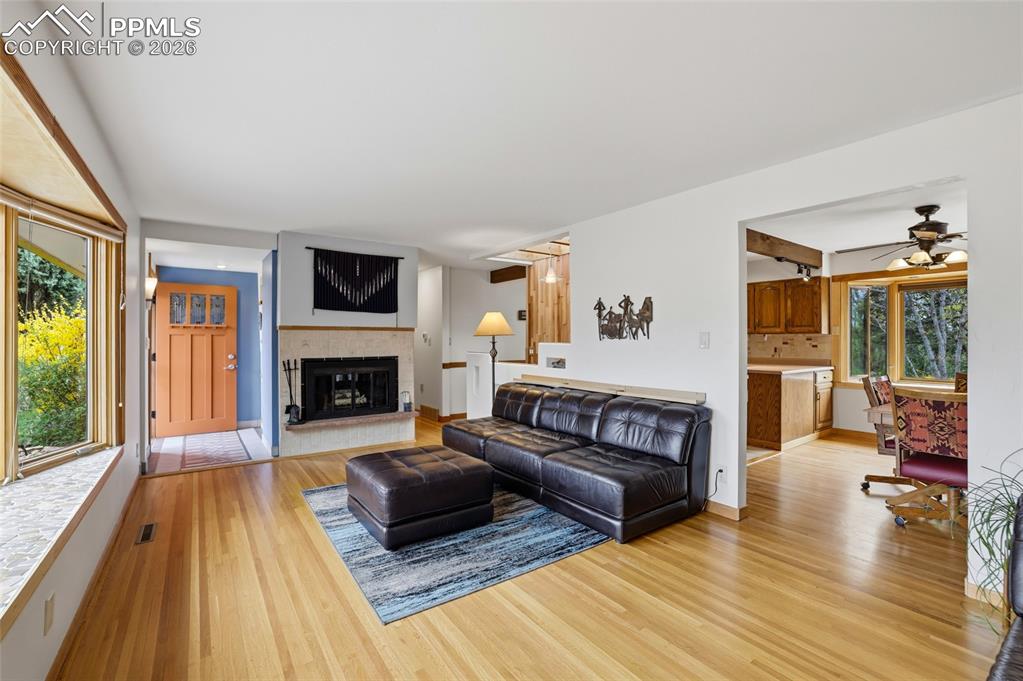 Image 5 of 50: Original oak floors throughout main level