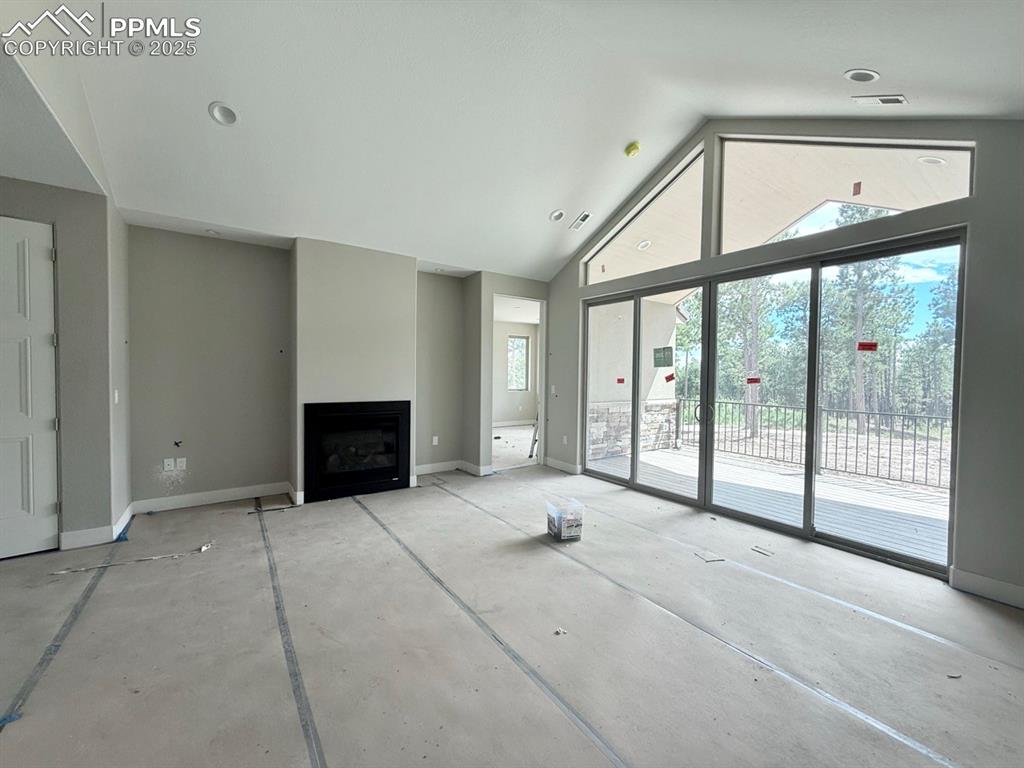 Image 10 of 23: Vaulted Ceilings, Wood Flooring, Gas Fireplace