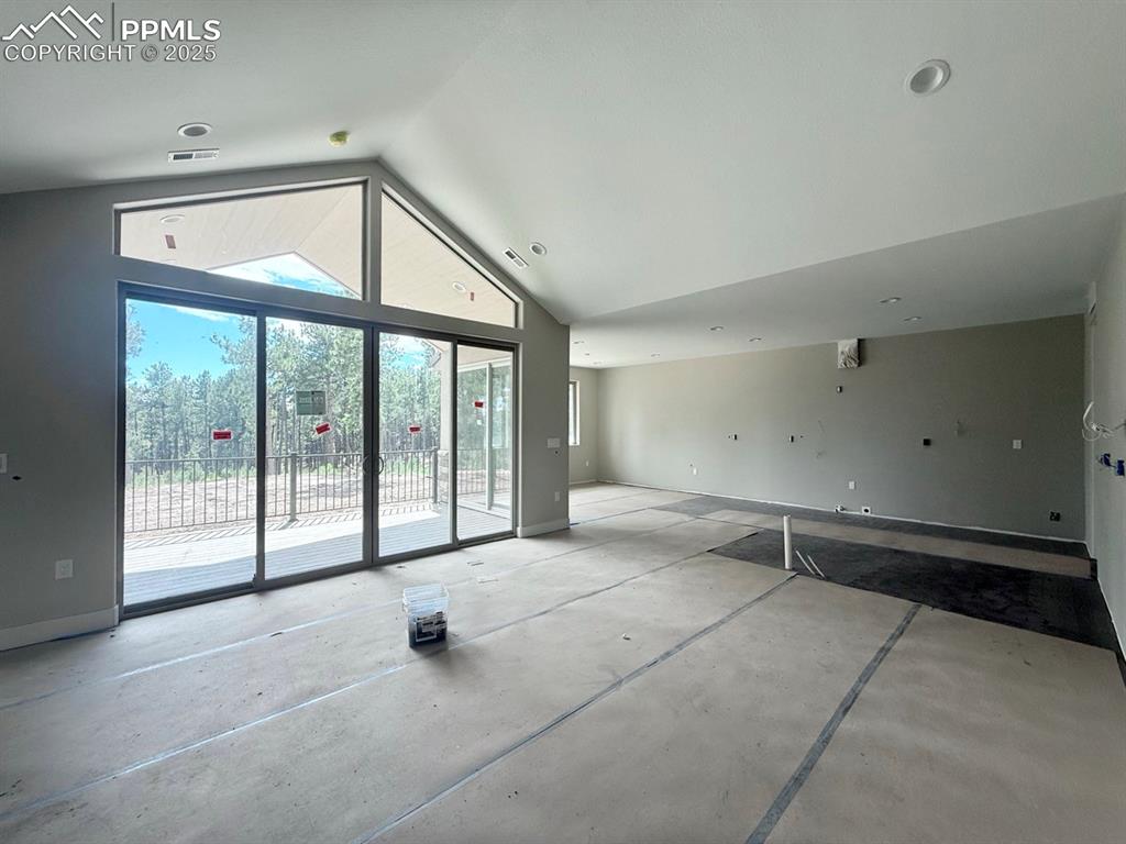 Image 11 of 23: Vaulted Ceilings, Wood Flooring, Gas Fireplace