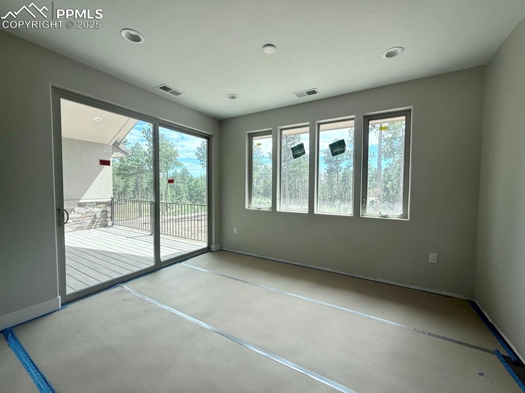 Image 13 of 23: Wood Flooring, Covered Deck Access
