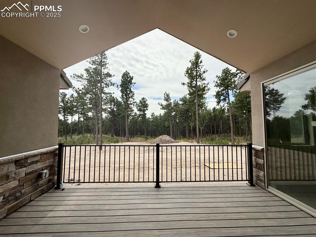 Image 19 of 23: Covered Composite Decking, Views of Wooded Open Space