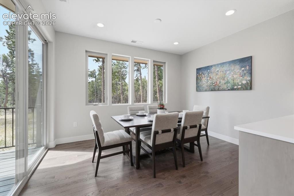 Image 7 of 18: Dining Room with Deck Access.