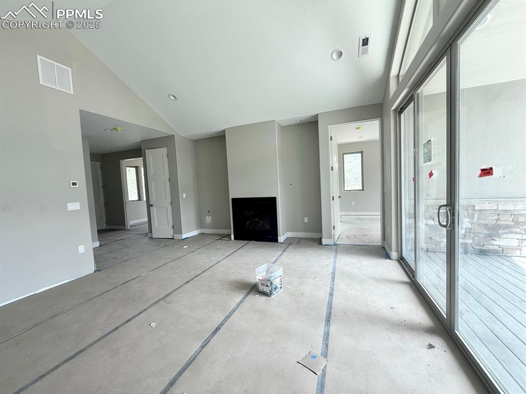 Image 9 of 23: Vaulted Ceilings, Wood Flooring, Gas Fireplace