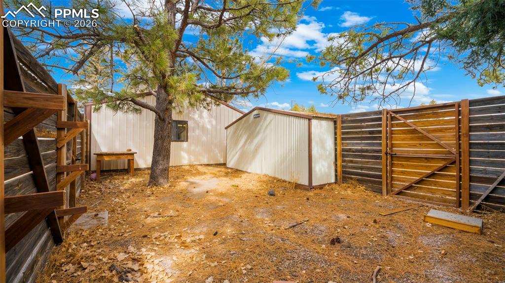 Image 35 of 48: Chicken area/dog run