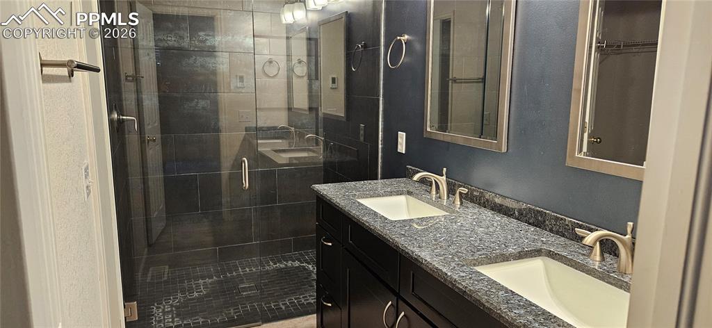 Image 11 of 19: Primary Bathroom with walk in closet