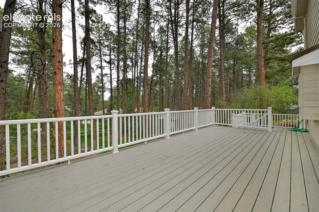 Image 12 of 50: Roomy Trex Deck in the back