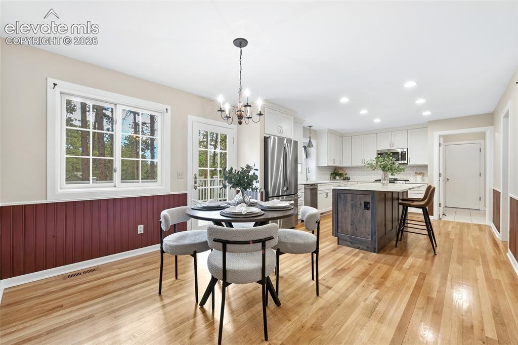 Image 14 of 50: Gorgeous kitchen with hardwoods...