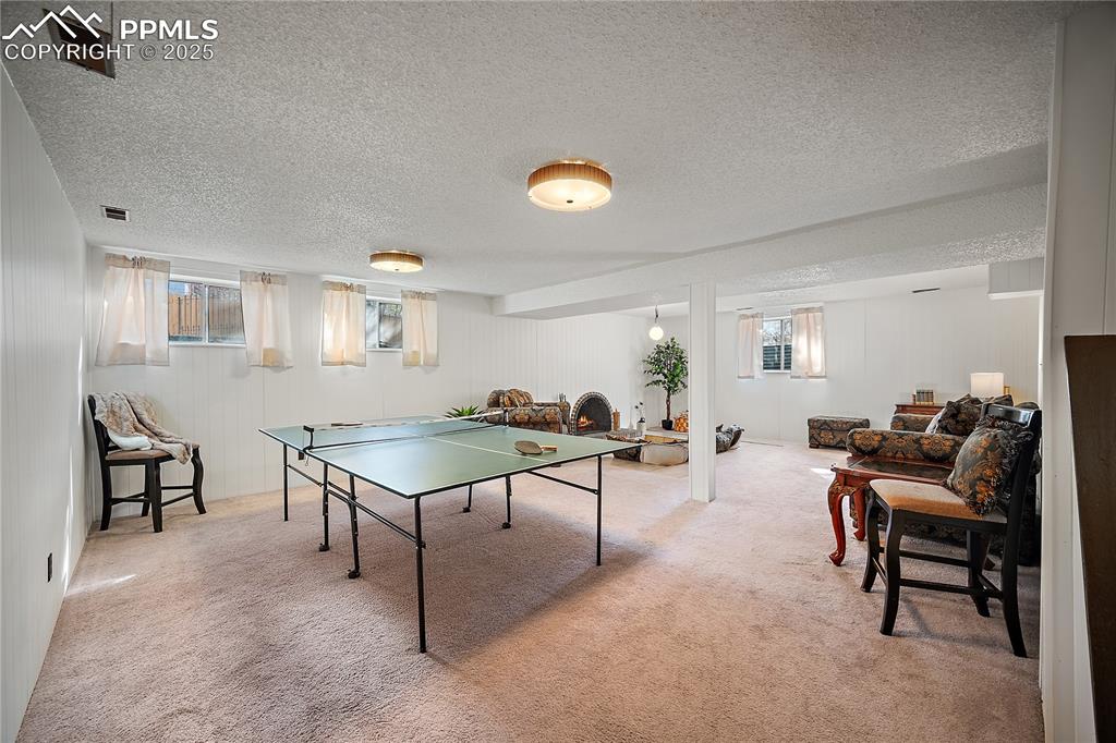 Image 32 of 49: Finished basement family/rec room