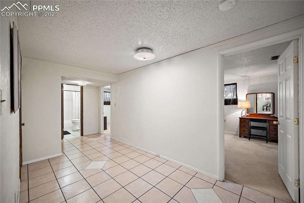 Image 35 of 49: Basement hallway