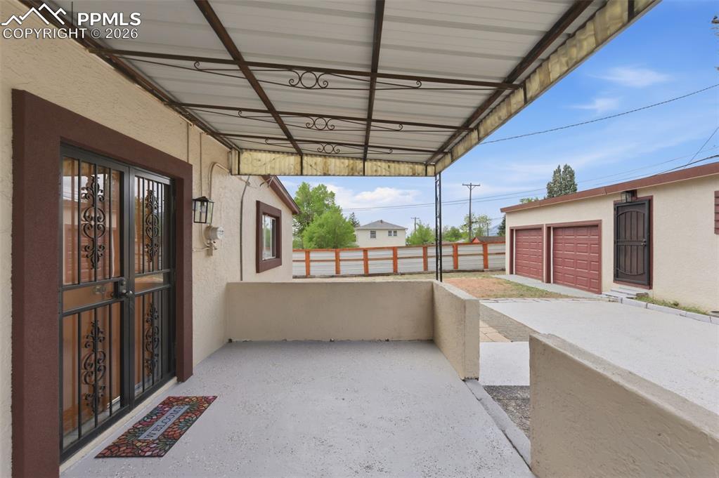 Image 28 of 48: Back patio - recently water-locked and cement stained. 