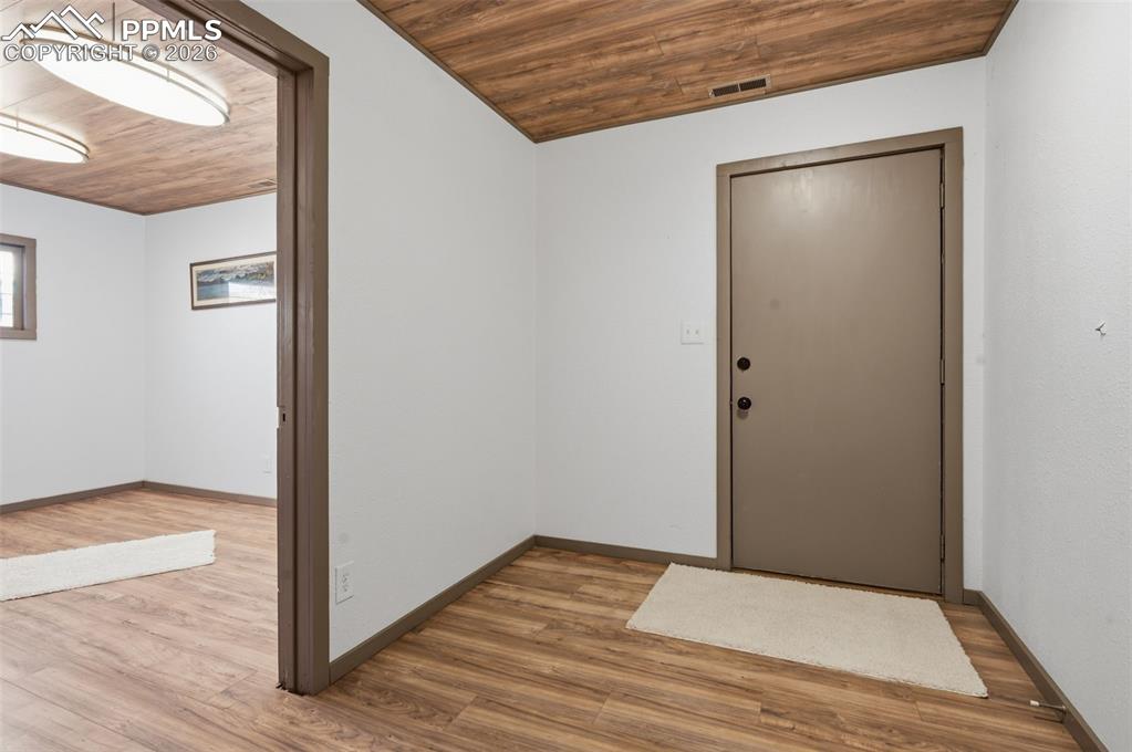 Image 36 of 48: View of entry into the office/guest quarters. 