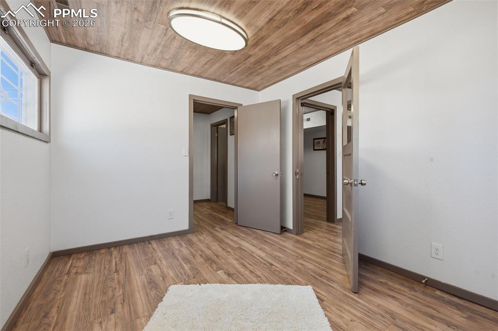 Image 38 of 48: Main room recently painted, LED lighting and LVP flooring. 