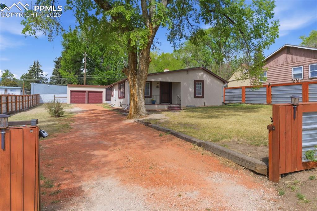 Image 44 of 48: There is a sprinkling system in the front yard. 