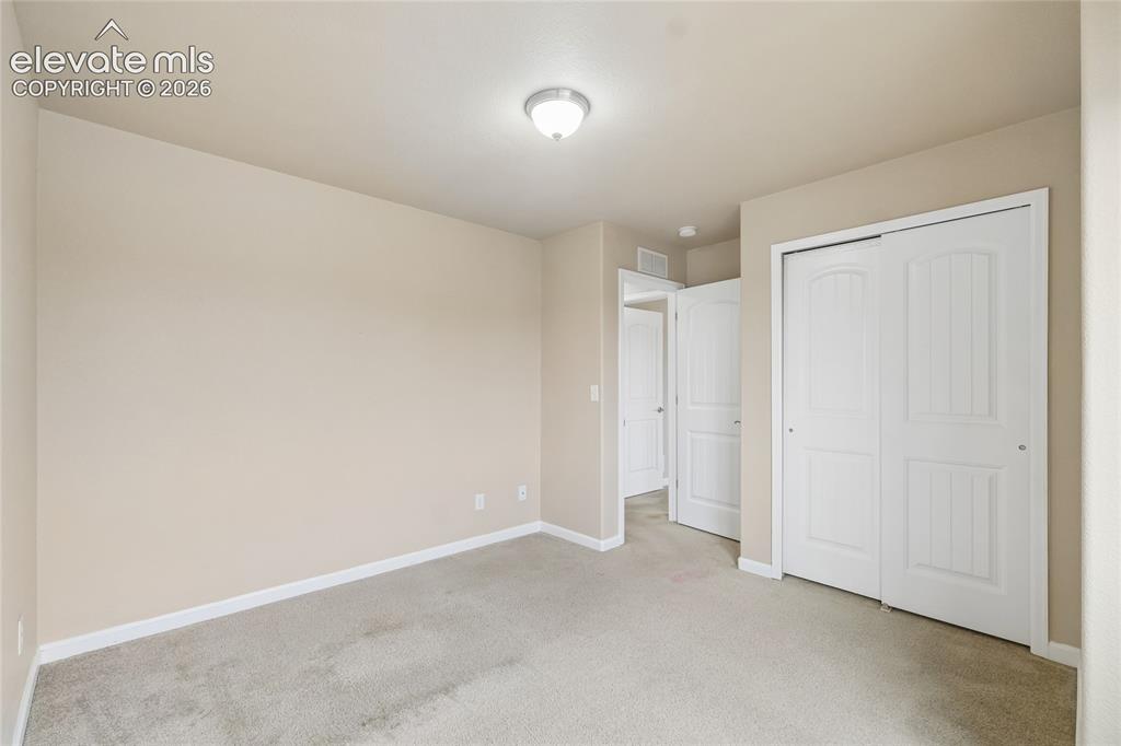 Image 12 of 19: Bedroom