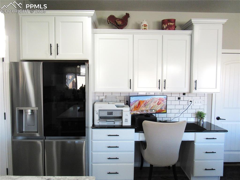 Image 12 of 37: Upgraded refrigerator and office nook