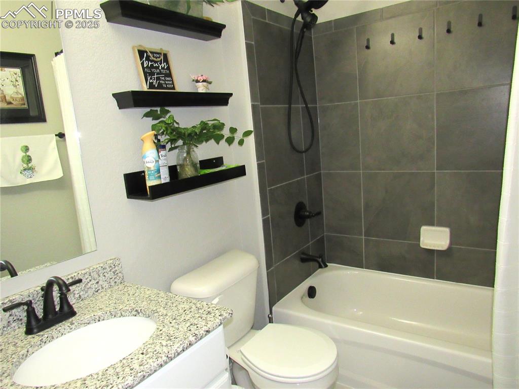 Image 15 of 37: Main level full bathroom