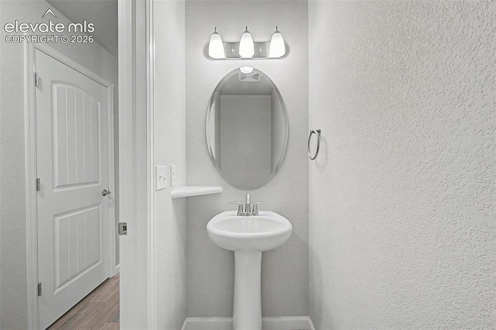 Image 18 of 28: Conveniently located main-level powder room