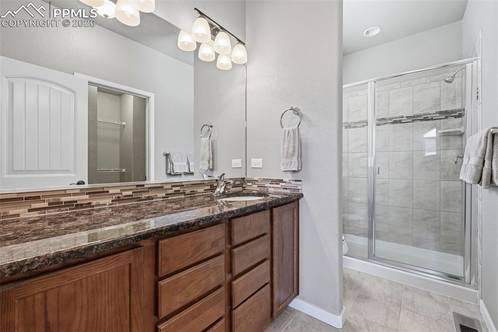 Image 18 of 30: Master bedroom