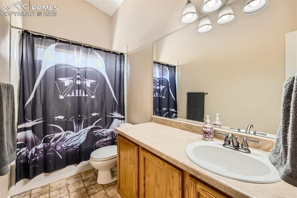 Image 16 of 49: 2nd full bath on main level