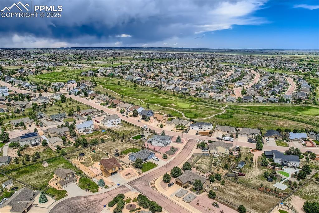 Image 31 of 49: Aerial view of property and surrounding area