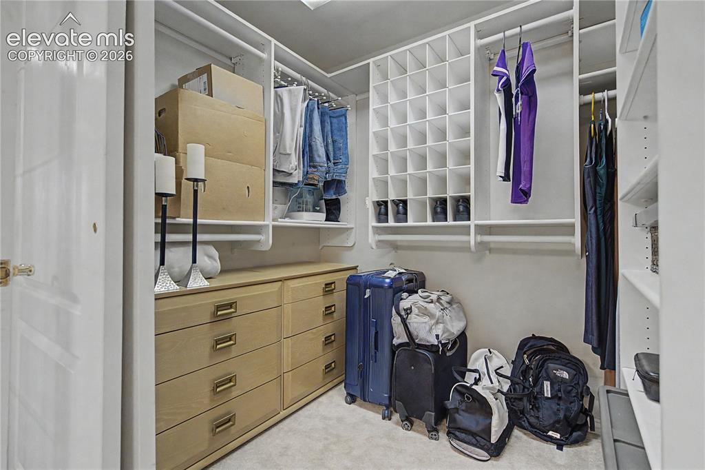 Image 15 of 35: Main Floor Primary Walk In Closet