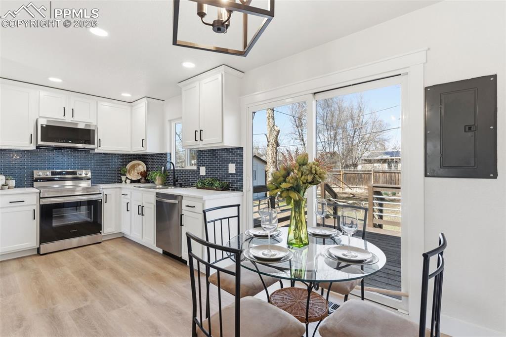 Image 14 of 37: Dining area positioned for easy meals and connected conversation