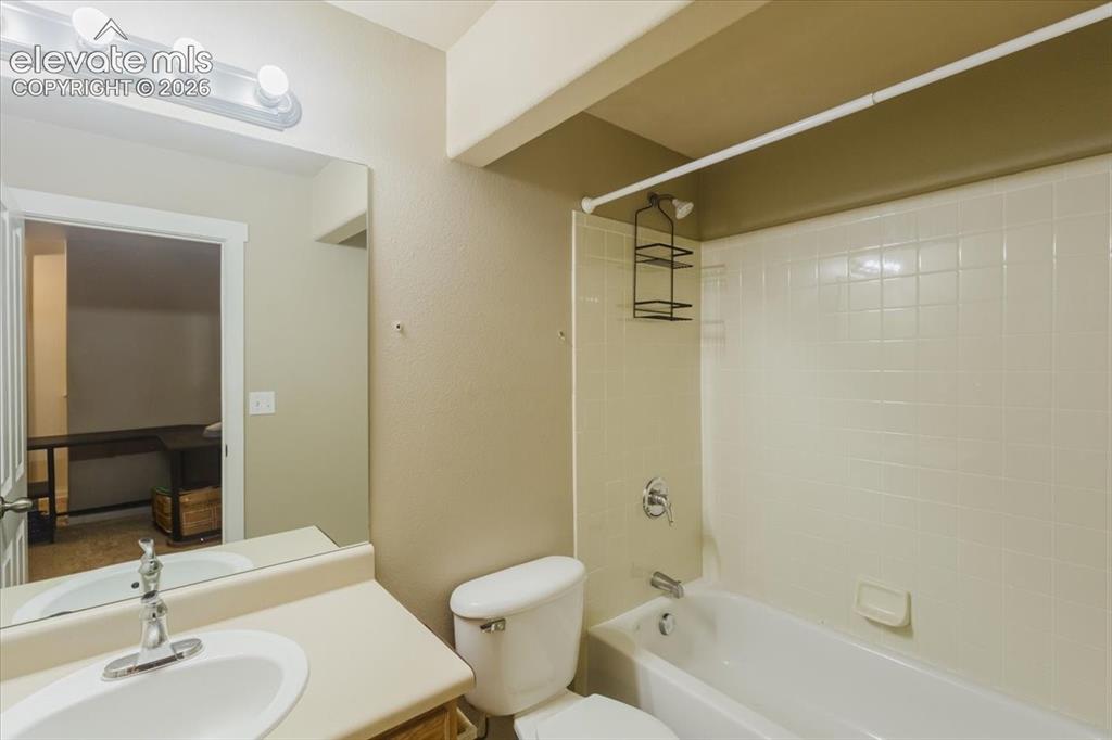 Image 19 of 33: Second primary bedroom upstairs with attached bath and walk-in closet
