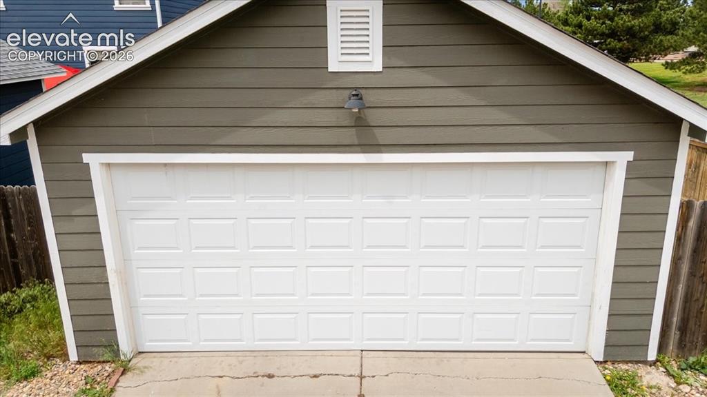 Image 2 of 33: 2 car detached garage in back