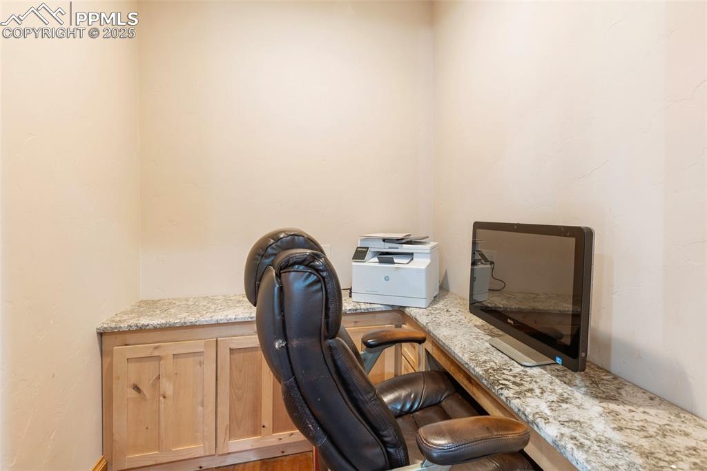 Image 33 of 46: Office with built in desk