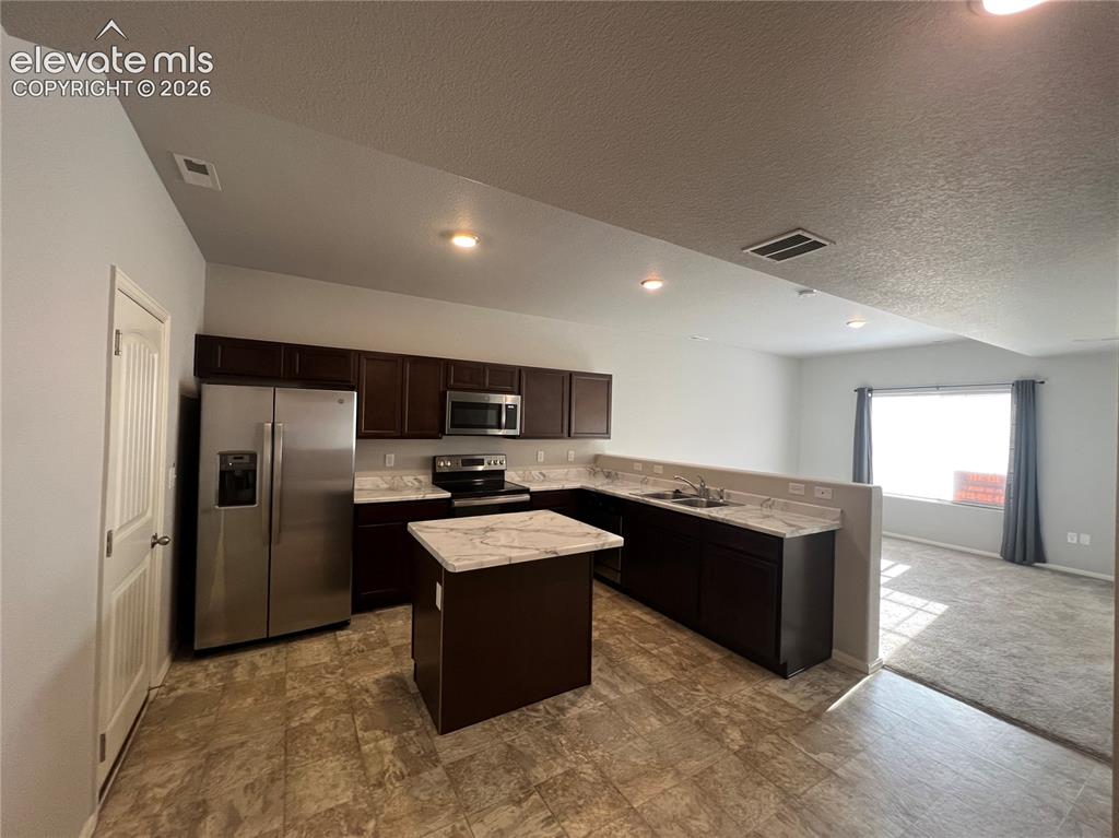 Image 6 of 23: Kitchen