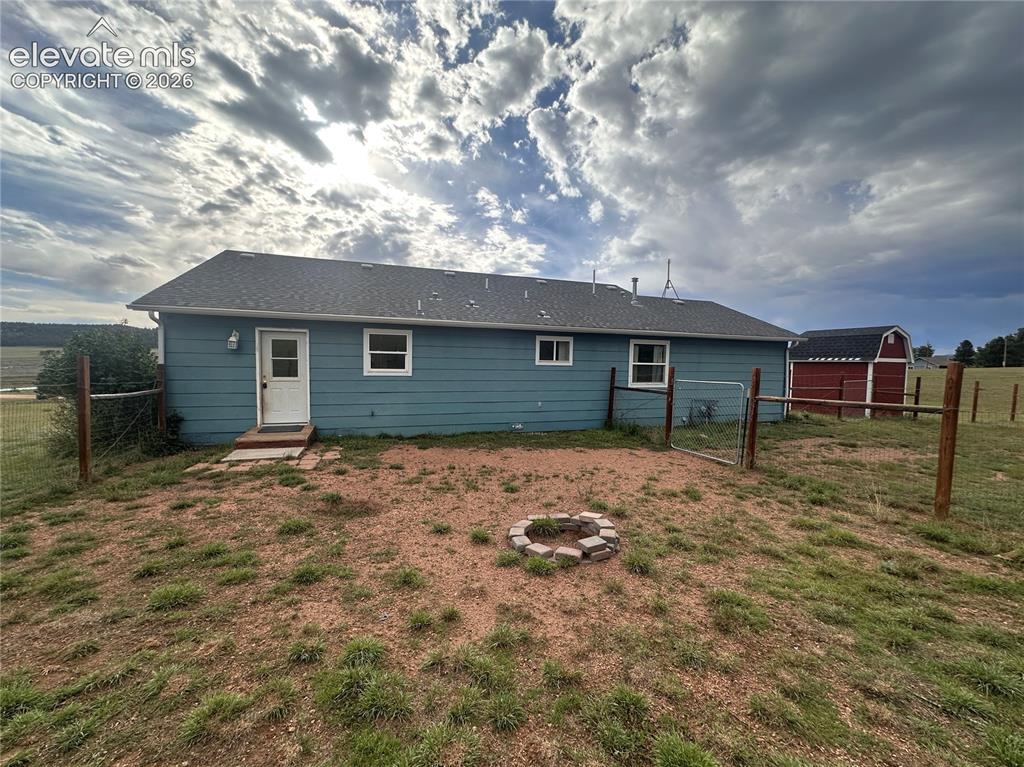 Image 10 of 38: Back of Structure