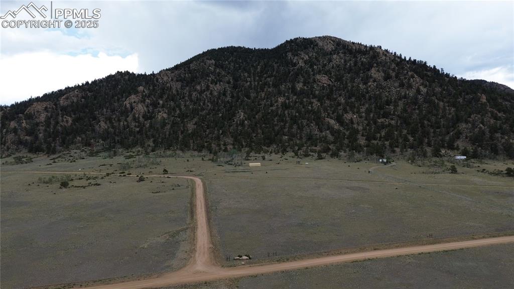 Image 2 of 8: View of mountain background with rural landscape