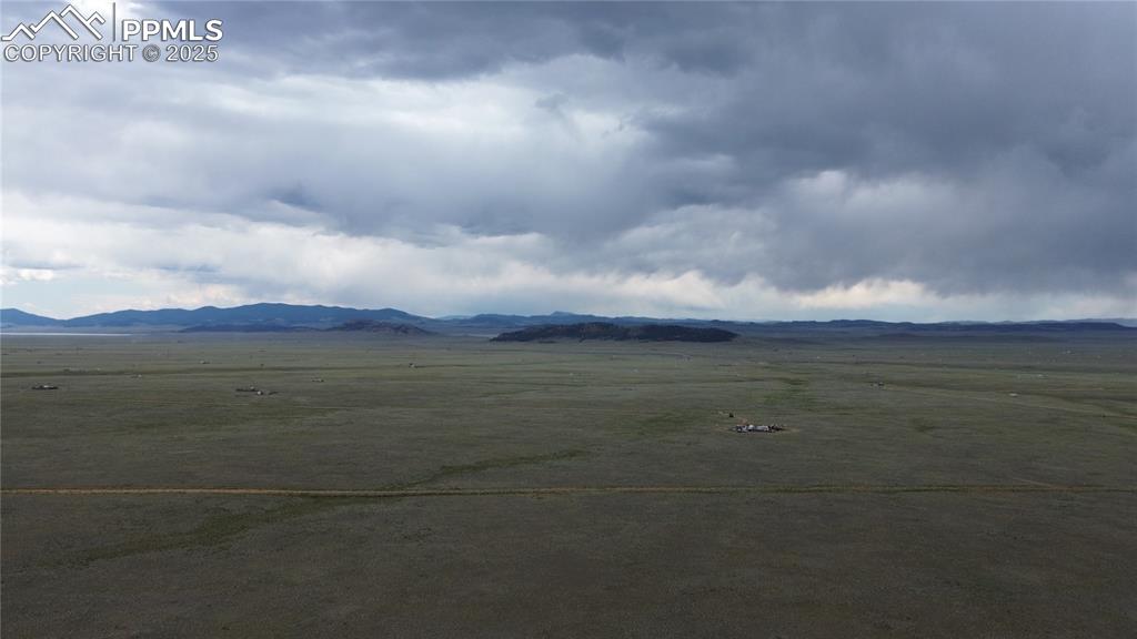 Image 5 of 8: View of mountain background with rural landscape