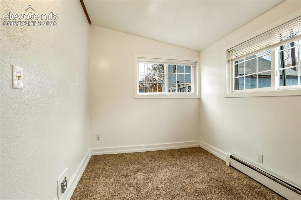Image 12 of 33: Unit 2 - Back room