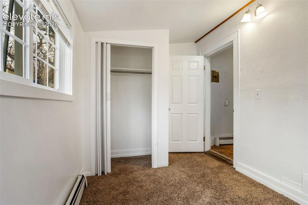 Image 13 of 33: Unit 2 - Back room