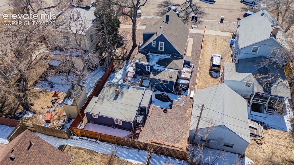 Image 29 of 33: Birds eye view of property with a residential view