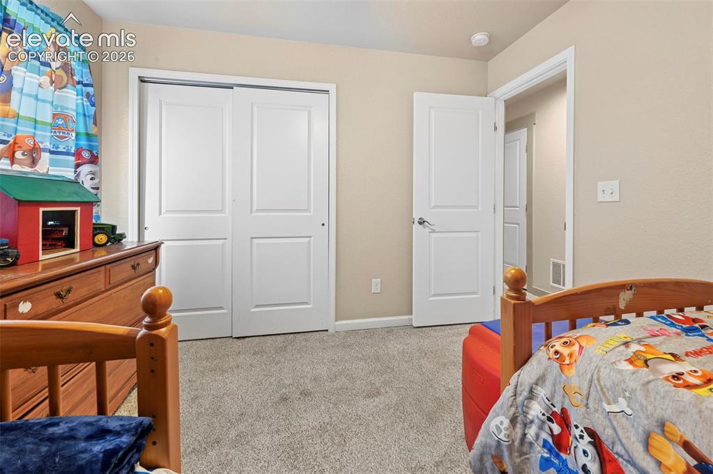 Image 21 of 29: Bedroom