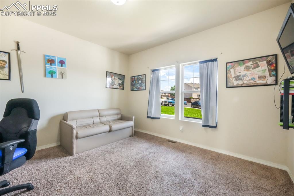 Image 7 of 48: Carpeted office featuring baseboards
