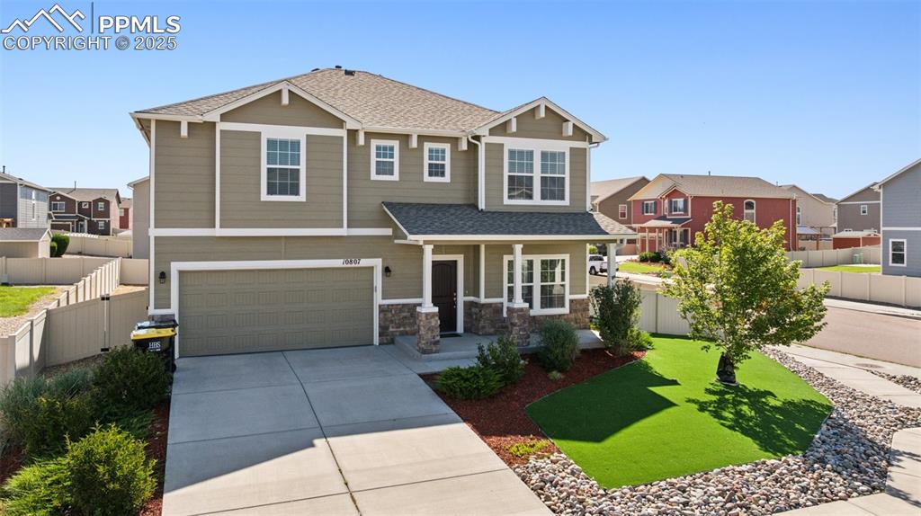 Image 29 of 39: Craftsman house featuring a shingled roof, a residential view, driveway, an