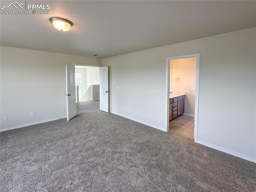 Image 14 of 30: Master Bedroom